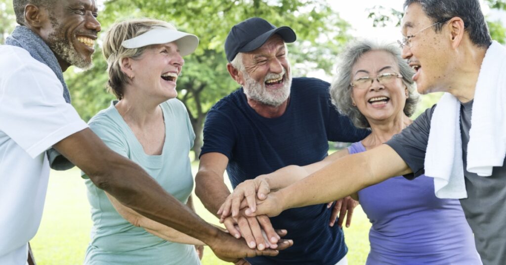 Group Of Senior Retirement Exercising Togetherness Concept