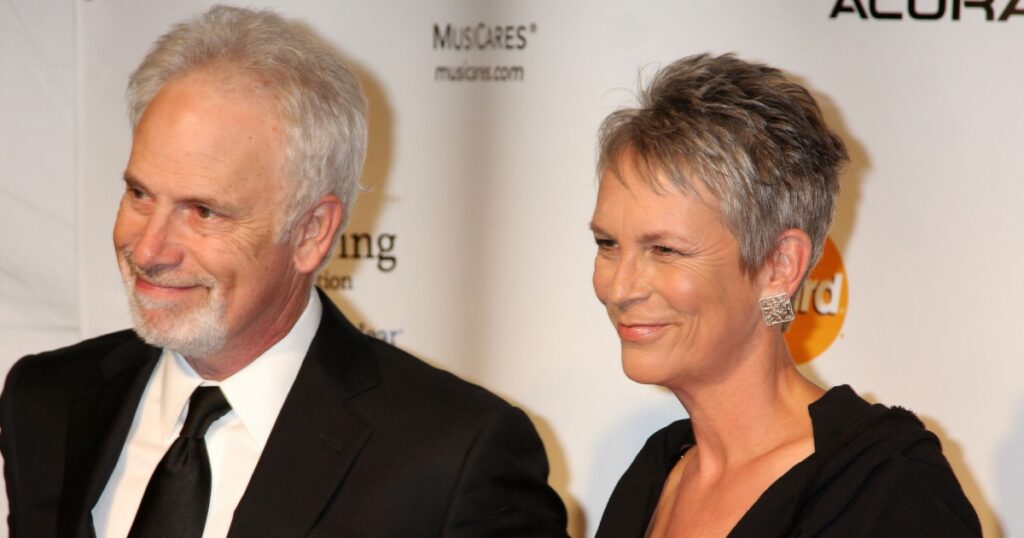 LOS ANGELES - FEB 11: Christopher Guest, Jamie Lee Curtis arrives at the Muiscares Gala Honoring Barbra Streisand at Convention Center on February 11, 2011 in Los Angeles, CA