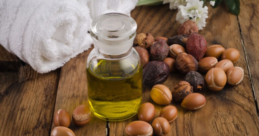Argan oil for massage and argan fruit. Spa mood