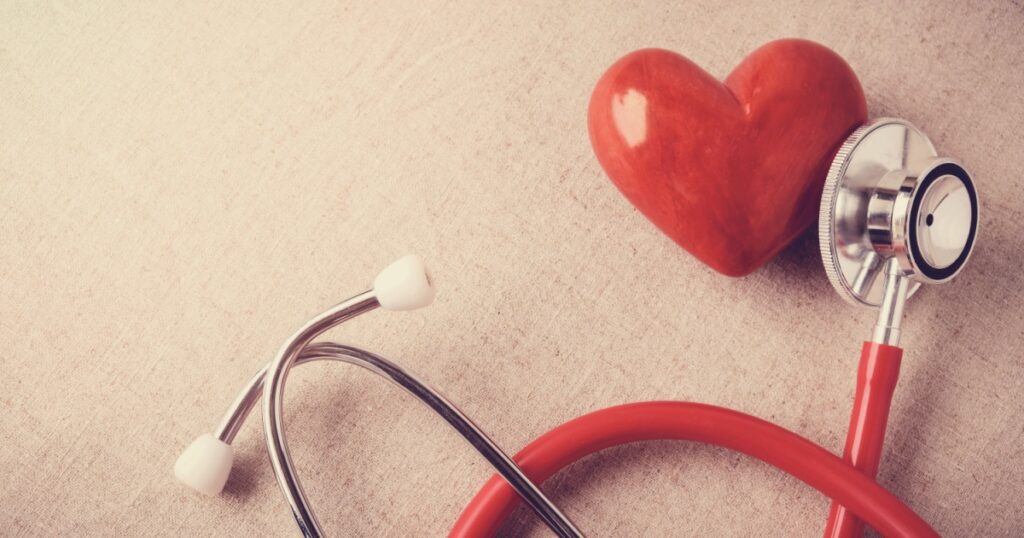red heart with stethoscope, heart health, health insurance concept, world health day, doctor day, world hypertension day