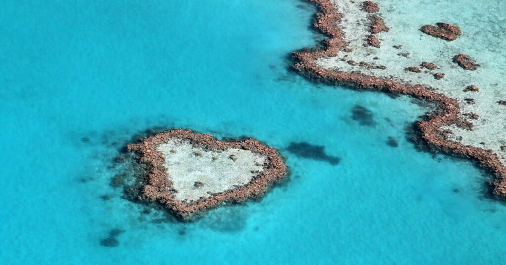 Heart reef impact in the tropical blue ocean