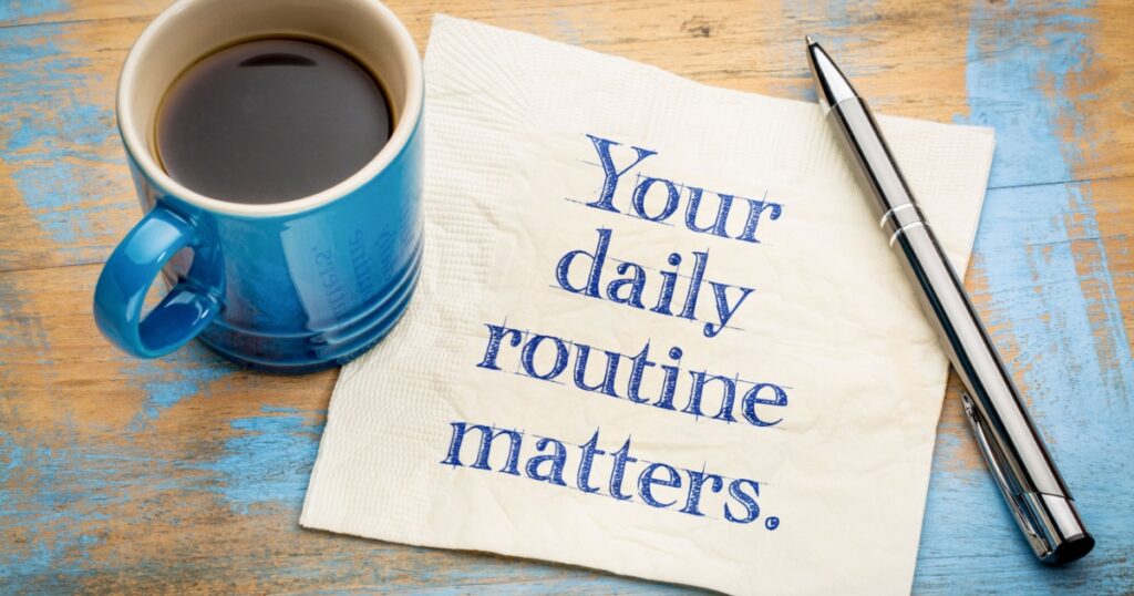 Your daily routine matters - handwriitng on napkin with a cup of coffee