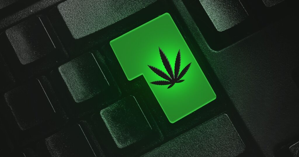 The hemp symbol on the keyboard button. The concept of buying and selling hemp.