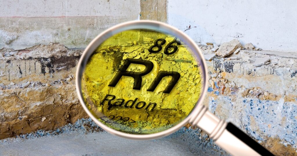 Preparatory stage for the construction of a ventilated crawl space in an old brick building - Searching gas radon concept image seen through a magnifying glass.