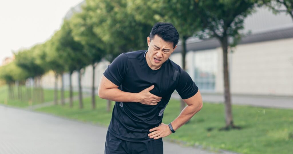Male asian athlete, has chest pain