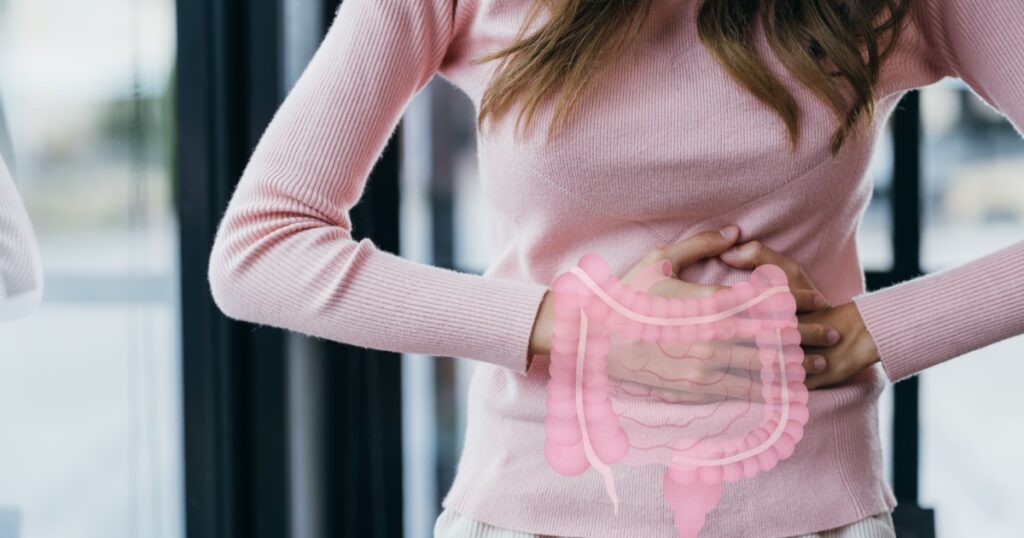 woman hands touching on stomach with intestine virtual icon, probiotics food for gut health, colon cancer, bowel inflammatory. Healthy feminine concept.