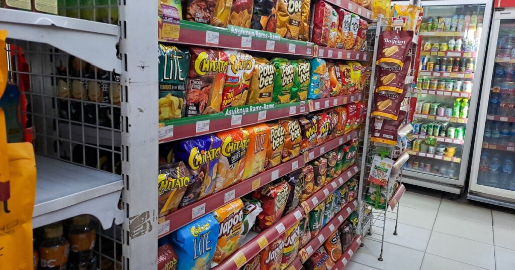 Medan, October 29 2023: various snacks arranged on shelves for sale look neat and clean