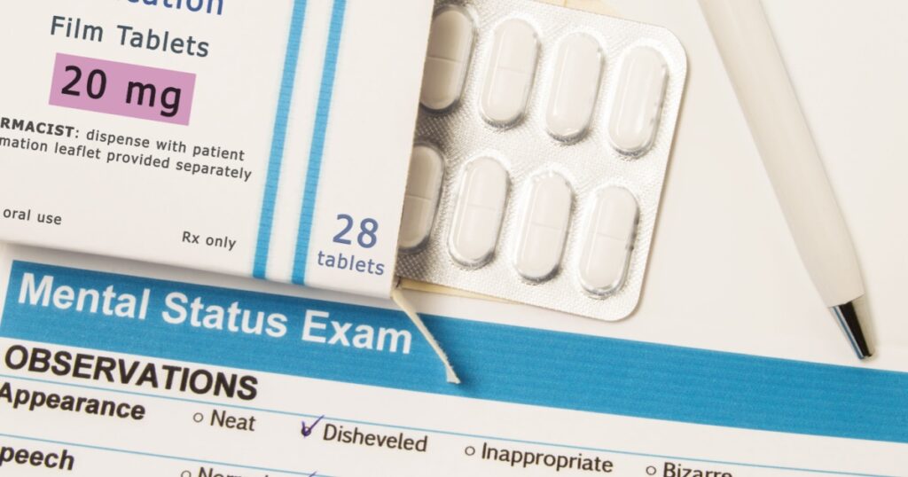 Antidepressant Medications or drugs. Packing box with blister of drug, which is name of Antidepressant Medications lies next to result of Mental status exam, conducted by psychiatrist to patient