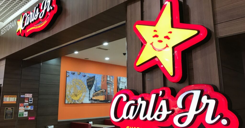 PETALING JAYA, MALAYSIA - OCTOBER 29, 2017: Carl's Jr. Charbroiled Burgers signage and restaurant inside shopping mall. Carl's Jr. Restaurants LLC is a fast food restaurant chain.