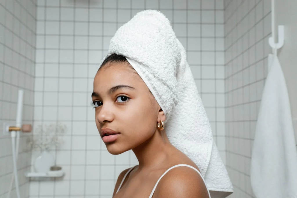 Woman with towel wrapped hair