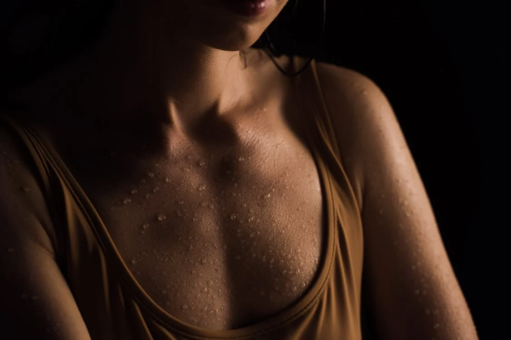 Sweat droplets on chest