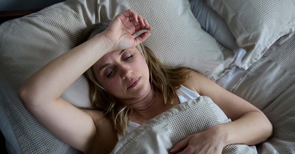 Sweating In Your Sleep? 7 Possible Reasons for Night Sweats - Featured image