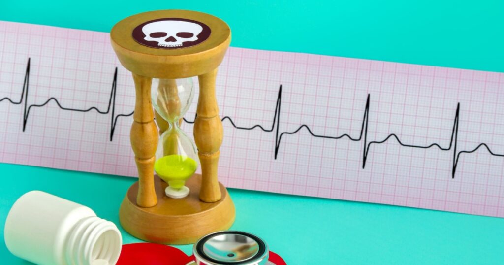 Medical stethoscope, drugs for normal heart work, sandglass with a symbol of death on a blue background.Leaving about cardiology, health, protection, prevention.