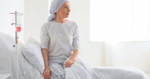 Mature woman after chemotherapy in clinic