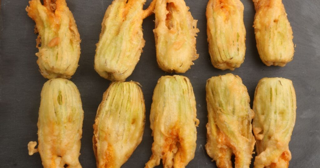 zucchini cooked flowers in tempura as vegan food