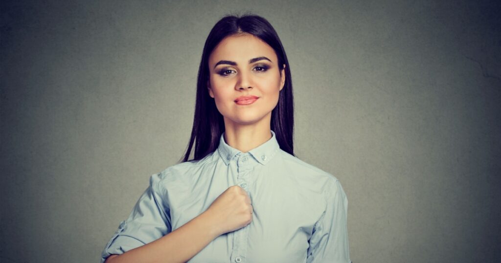 Confident young woman isolated