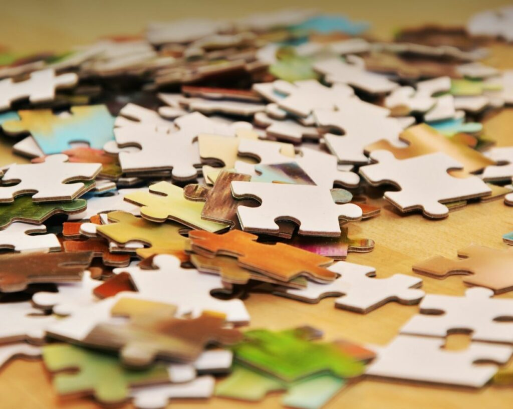 Puzzle pieces spread out. 