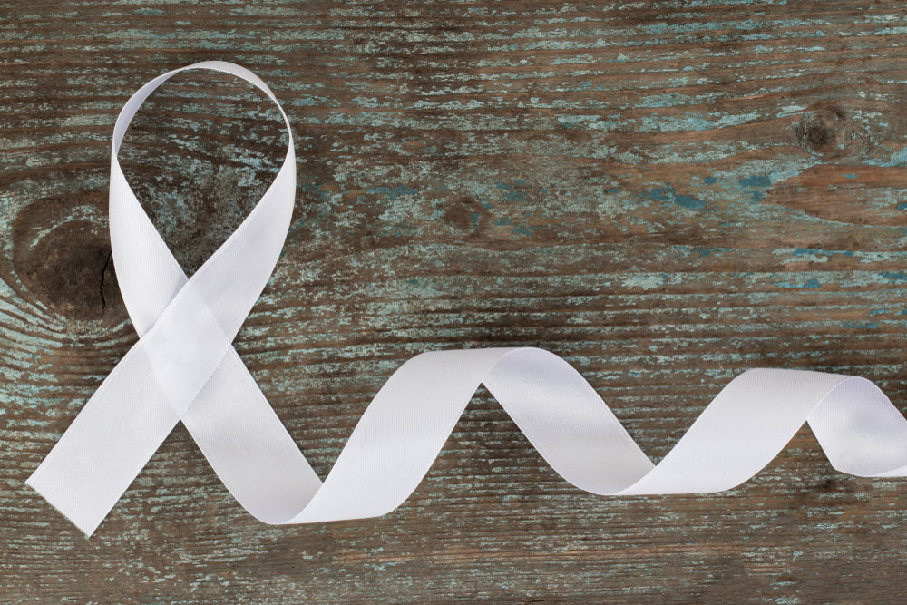 white ribbon. White or light pearl color ribbon for raising awareness on Lung cancer, Bone cancer, Multiple Sclerosis, Severe Combined Immune Deficiency Disease (SCID) and Newborn Screening  symbol.