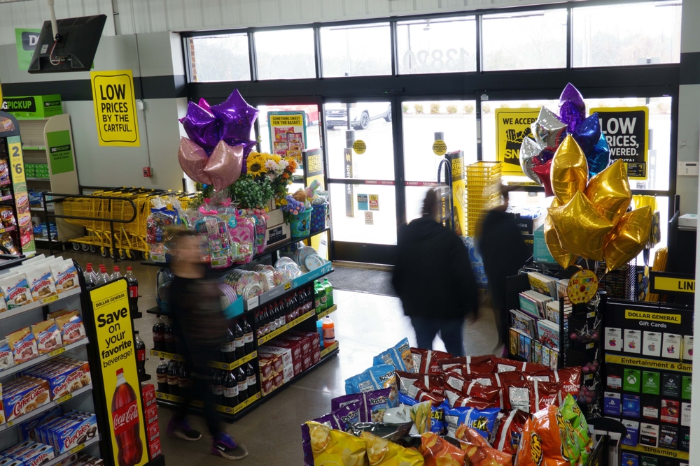 OLD HICKORY, UNITED STATES - Mar 16, 2022: A Dollar General store with customers exiting after checking out
