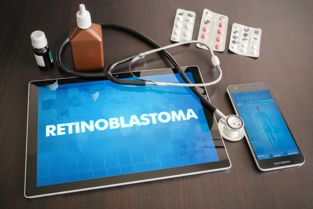 Retinoblastoma (cancer type) diagnosis medical concept on tablet screen with stethoscope.