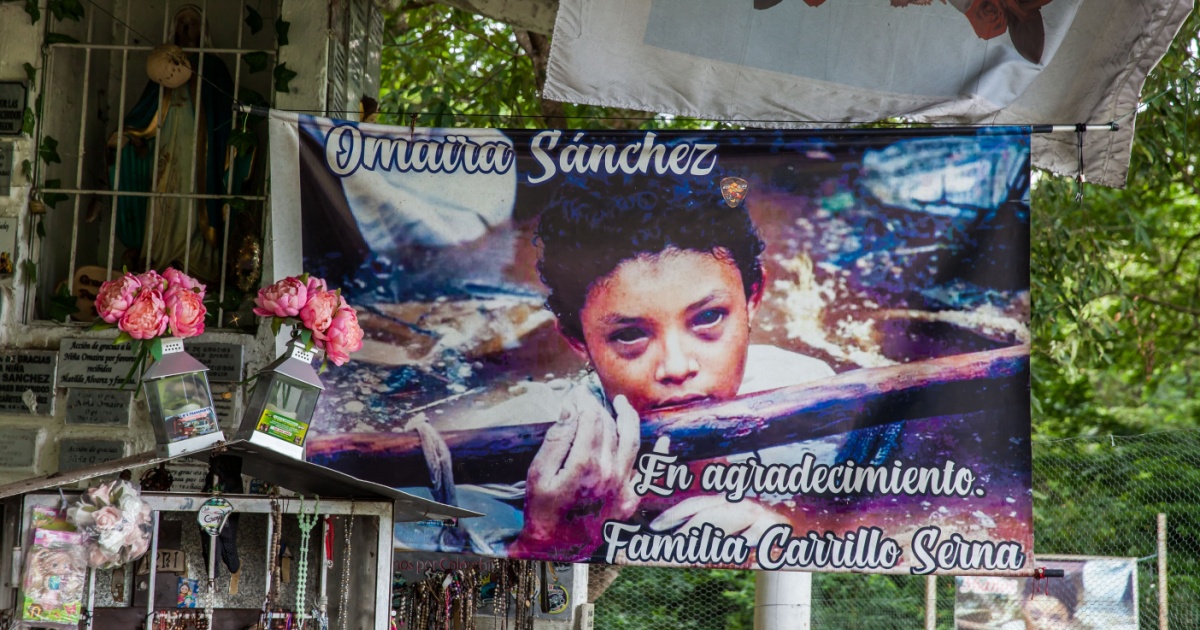 ARMERO, COLOMBIA - MAY, 2022: Gratitude poster to Omaira Sanchez at her place of burial in the destroyed Armero town.