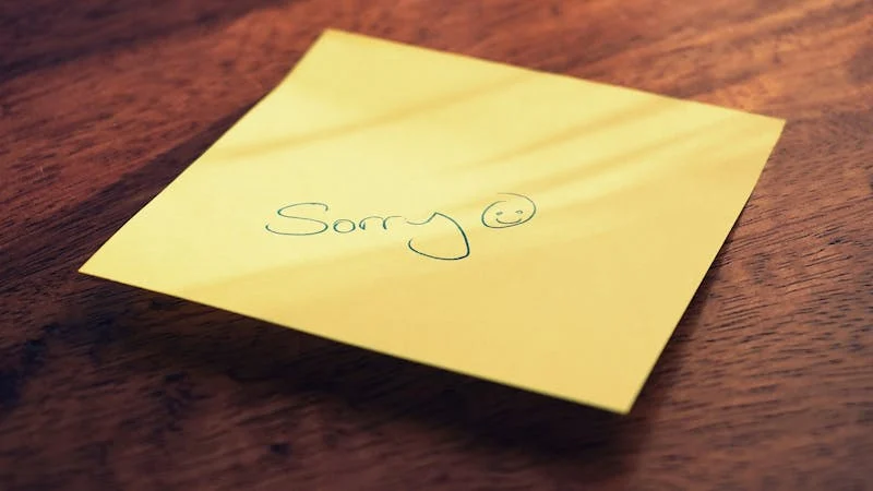 sticky note saying "Sorry" on it