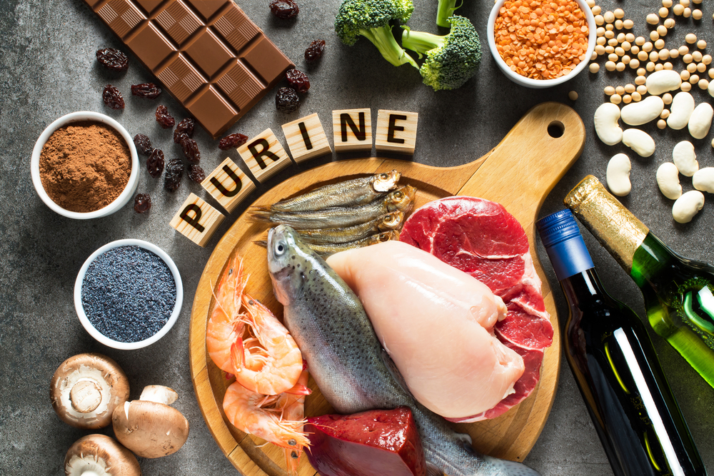 High purine foods as trout, shrimps, chicken breast, red meat, sprats, liver, beans, chocolate, lentils, mushrooms, beer, vine, cocoa, raisins, broccoli, soy, poppy seed