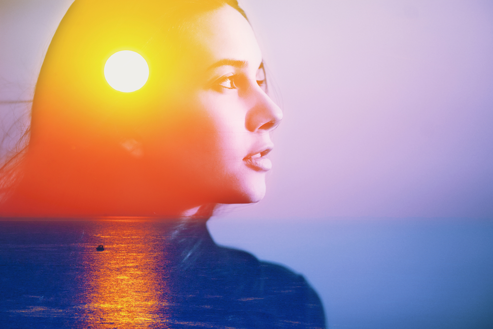 Human soul energy power spirit, inner peace, mental health therapy feel help gut care concept. abstract art portrait of happy woman head face side portrait look at sun sea nature sunrise sunset in sky