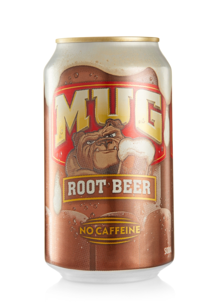 LONDON,UK - OCTOBER 21, 2021 : Aluminium can of Mug Root Beer drink on white background.