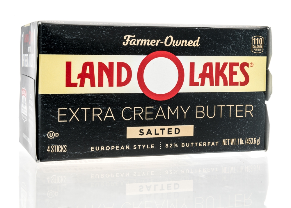 Winneconne, WI -30 January 2021: A package of Land o Lakes extra creamy butter salted on an isolated background