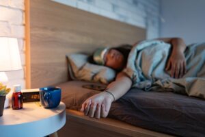 Millions Take Melatonin Every Night. Study Raises a Heart Concern. Woman,Sleeping,With,Sleep,Mask,,Using,Sleeping,Pills,,Melatonin.,Concept