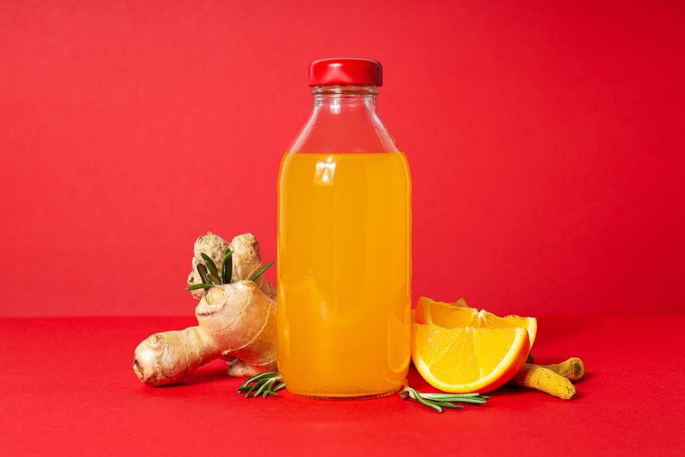 Concept of healthy drink - ginger turmeric liquid
