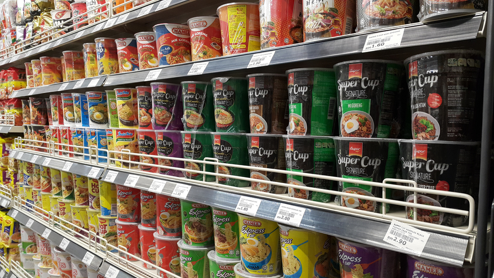 Kuala Lumpur, Malaysia - Jan 2017: Wide range of instant noodles products on shelf in supermarket. Instant noodles are often criticized as unhealthy & junk food which are high in carbohydrates and fat.