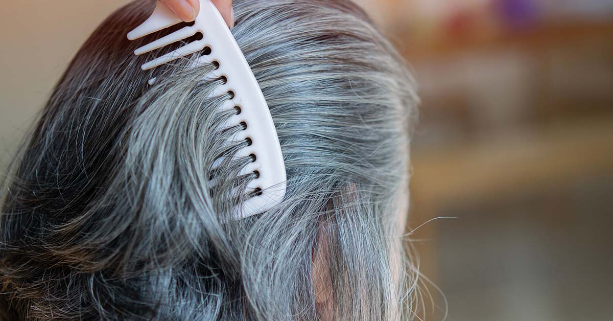 combing gray hair