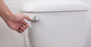 Disturbing video shows what happens if you don't close your toilet lid before flushing person flushing toilet