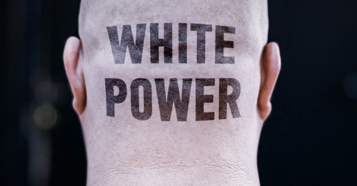 White Power tattooed on back of skinhead
