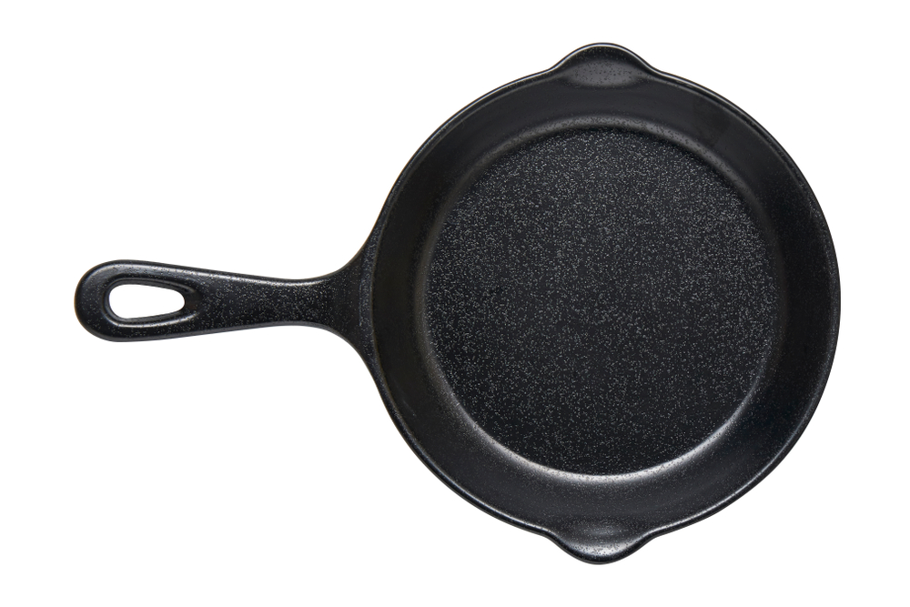 Cast iron skillet, Empty cast iron pan with handled, View from above isolated on white background with clipping path
