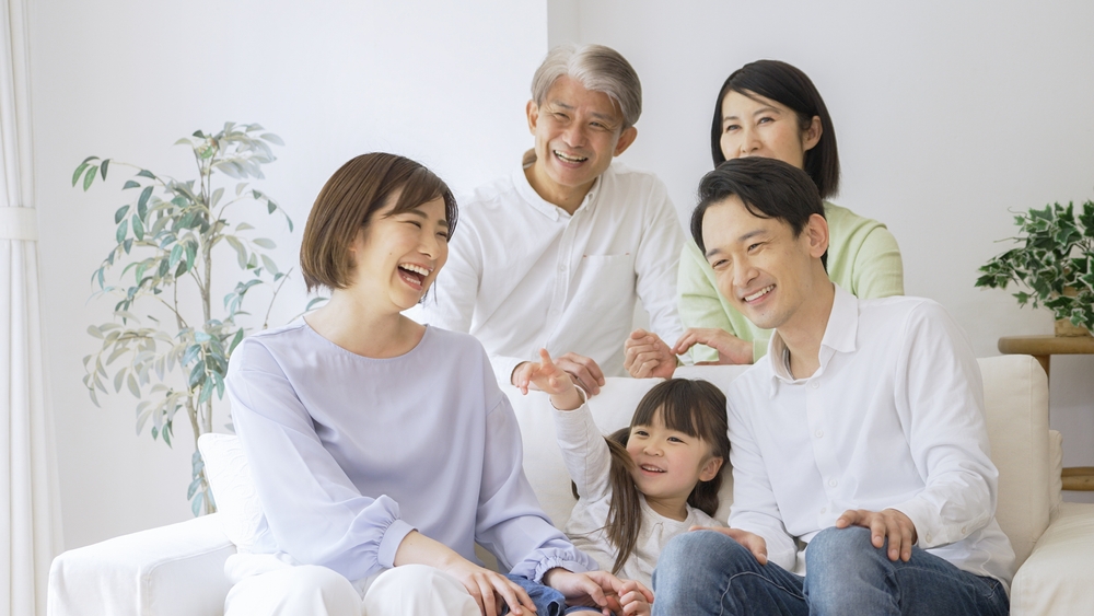 Asian family relaxing at home
