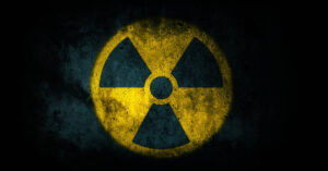 radiation symbol - a trefoil around a small central circle representing radiation from an atom