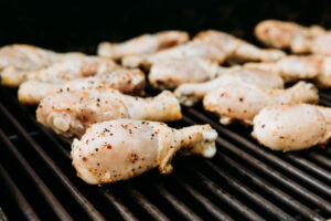 US Chicken Banned in the EU Since 1997, So Why Do We Still Eat It? Raw,Seasoned,Chicken,Drumsticks,On,The,Grill,,Grilling,Chicken