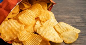 bag of potato chips spilled out on counter