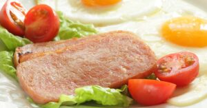 15+ Breakfast Dishes You Won’t See People Eat Anymore SPAM and eggs and sliced cherry tomatoes