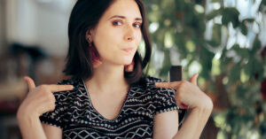 Deeply Selfish People Often Display These 12 Involuntary Behaviors woman pointing at her self. Selfishness concept
