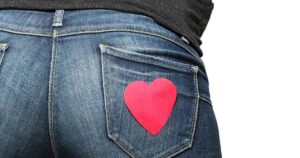 Scientists Discover Surprising Detail That Makes a Woman’s Bottom Attractive close up of woman's bottom in jeans with heart on back pocket