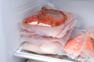 13 Foods That Pose Health Risks After Expiration, According to Food Safety Researchers Vacuum,Bags,With,Different,Products,In,Fridge.,Food,Storage