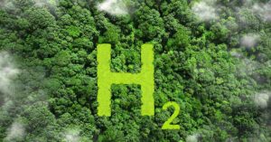 Underground Hydrogen Reserves Could Sustain Earth's Energy Needs for Over a Millennium, Study Shows Hydrogen symbol (H2) over top forested area.