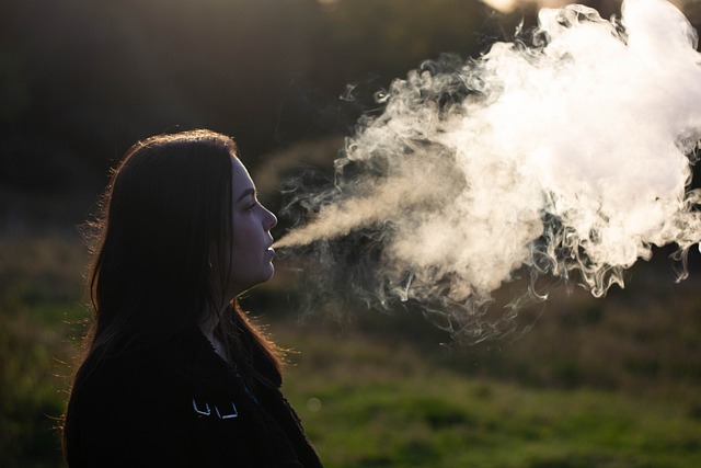 woman vaping outdoors