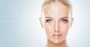 Portrait of attractive woman with a scnanning grid on her face. Face id, security, facial recognition concept.
