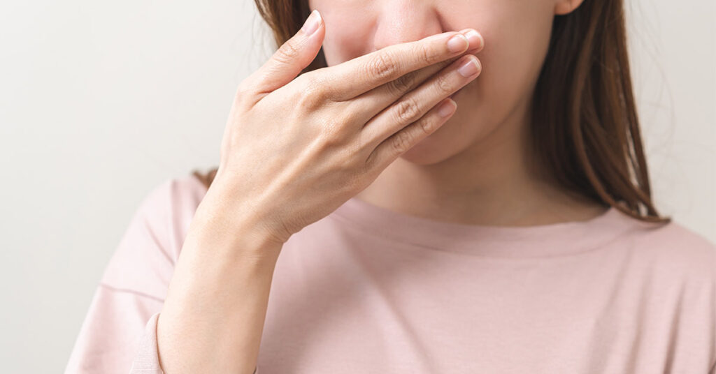 What causes bad breath and how do you get rid of it? - Featured image