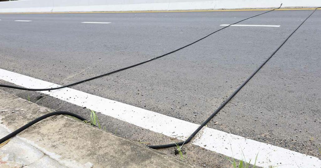 If You Ever See Black Cables Stretching Across The Road, This Is What You Should Do - Featured image